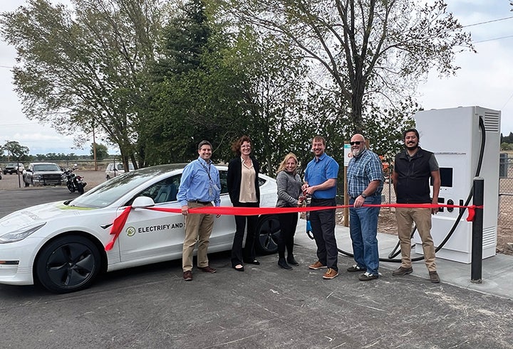 ribbon-cutting at EV charger