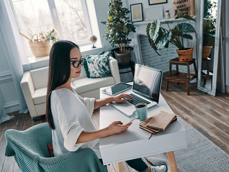 woman sitting at computer